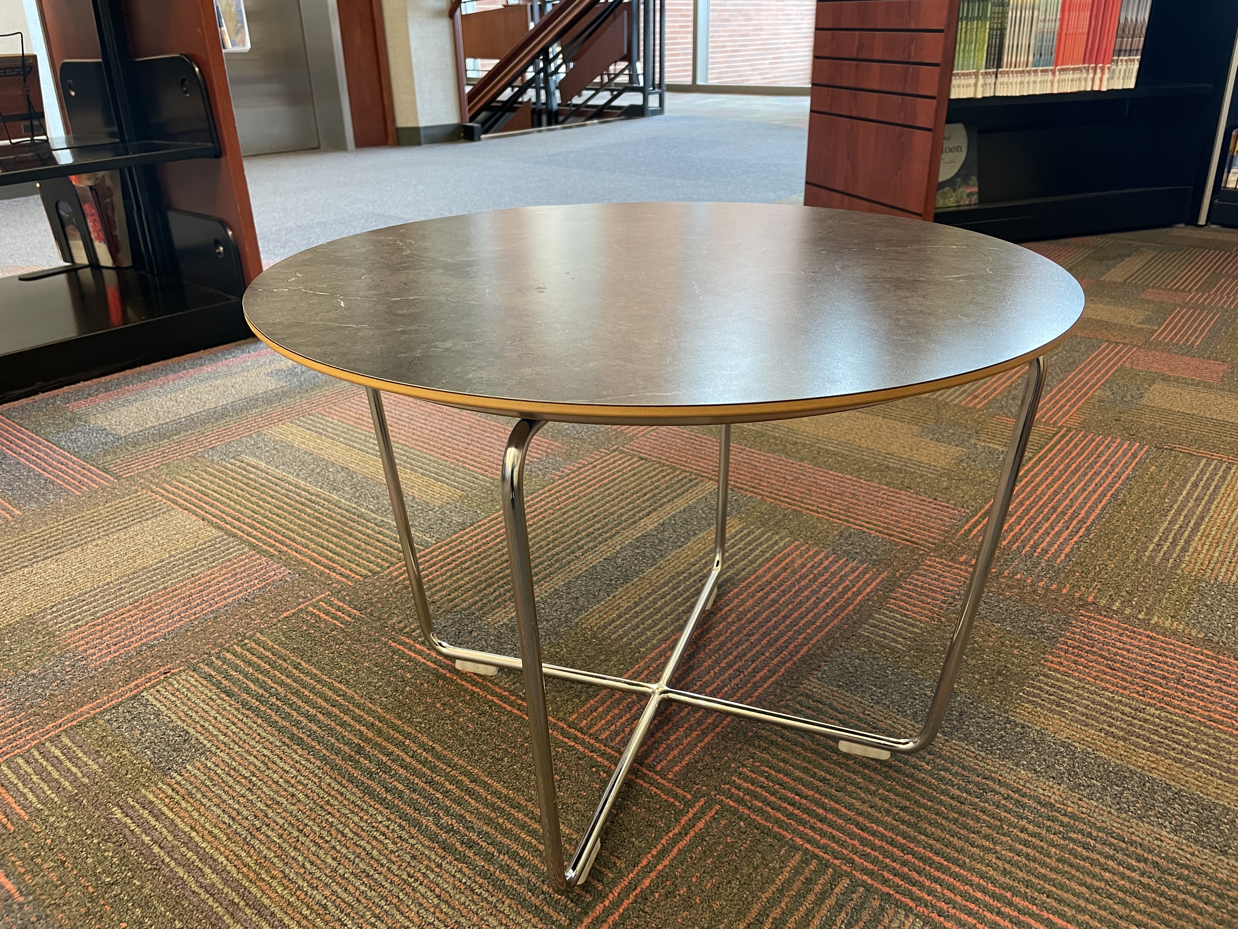 Round Table with metal legs | Reaching Across Illinois Library System