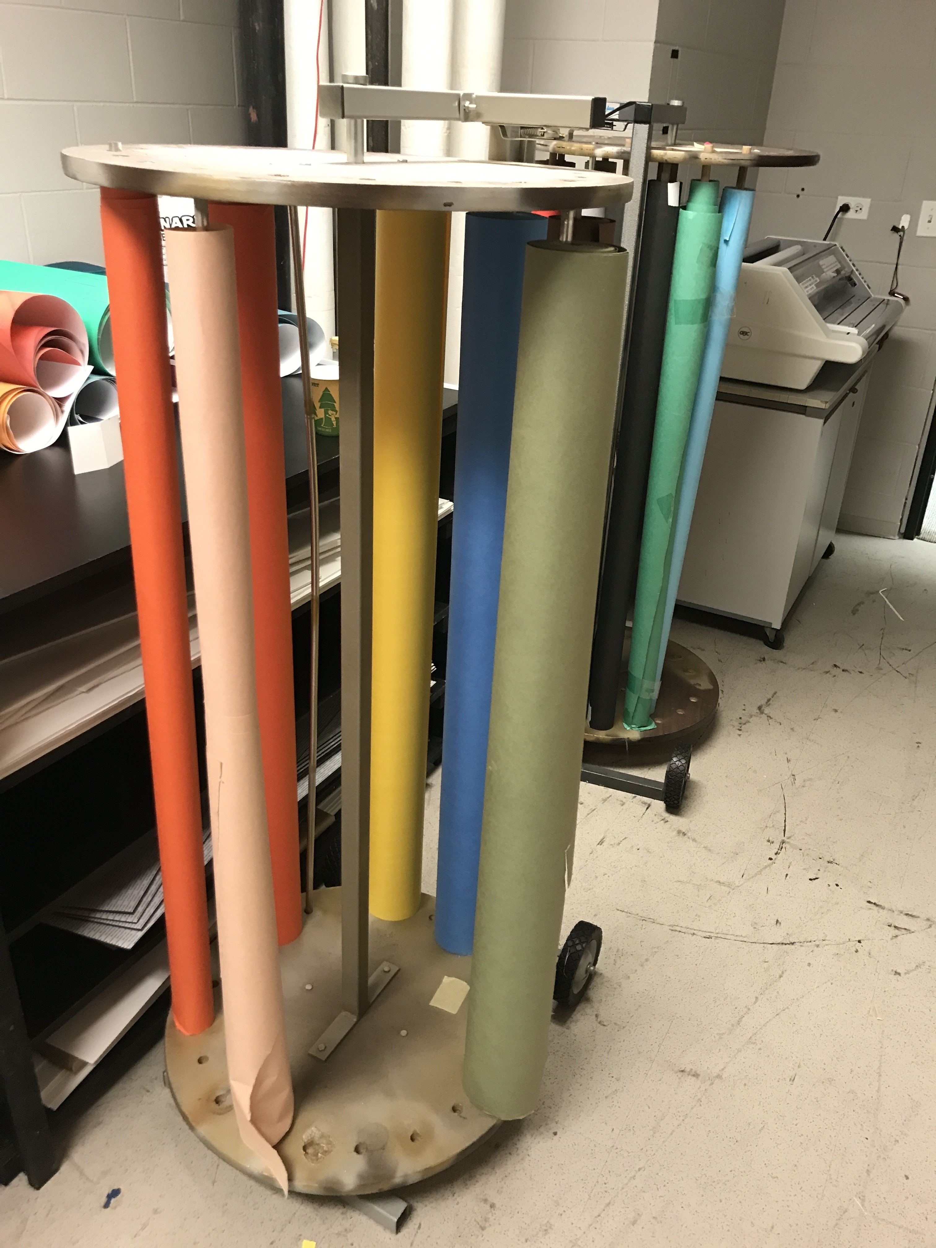 2 rolling paper-roll racks 60