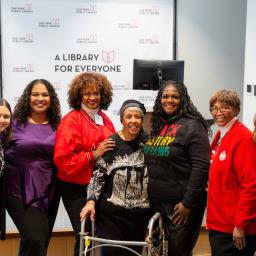 Group photo at Julian Legacy Museum reception, featuring Faith Julian in center. Photo by Tina Harle.