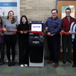 Library Trustees ribbon cutting ceremony for new ATM at the library.
