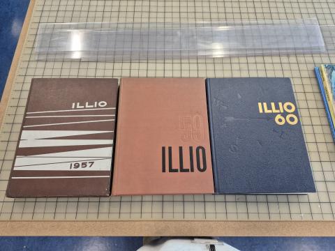 Three University of Illinois yearbooks from 1957, 1959, and 1960