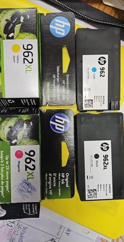 Ink Cartridges for an HP 962 in black, yellow, magenta and cyan
