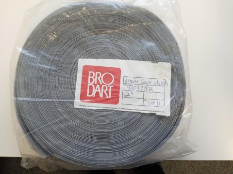 A roll of gray Brodart 2-inch binder tape