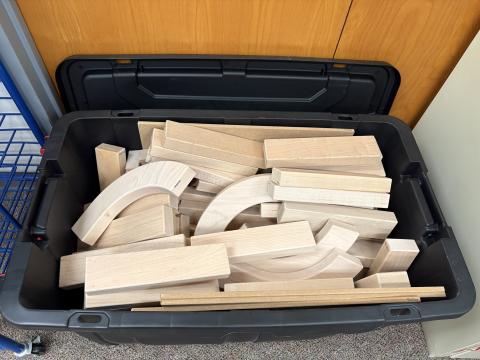 Wooden blocks in bin