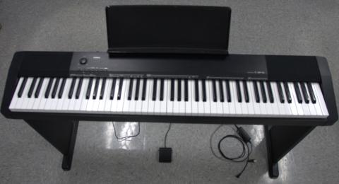 Photo of Casio CDP-135 Piano on stand