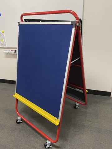 Programing easel on wheels- great for youth programs, one side dry erase and one side felt with holder for pieces