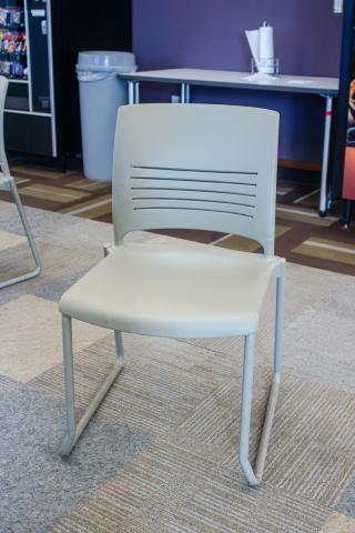 Gray plastic and metal sled base chairs