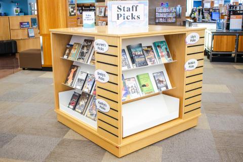 Large square four-sided book displays with slatwall
