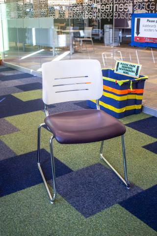 Metal sled base maroon seat plastic backed task chair