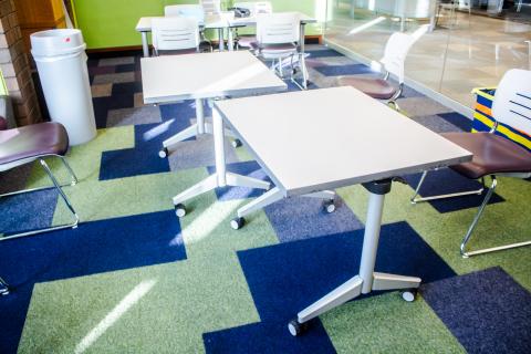 White top metal base folding wheeled table