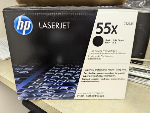 A boxed HP55X toner cartridge