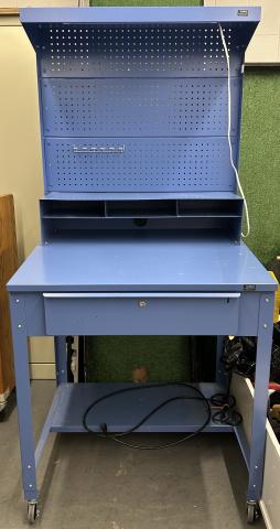 blue metal shop desk with drawer, shelf, and pegboard