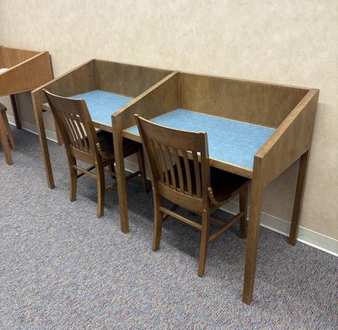 Combined study carrel with two chairs.