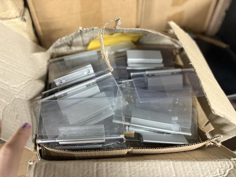 Open box of clip on shelf talkers