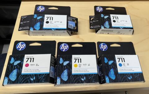 Five HP 711 inkjet cartridges
