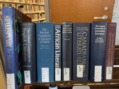 Several books on a book cart.