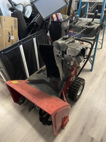 An image of a red toro snow blower