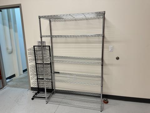 Photo of chrome wire shelving unit against white wall