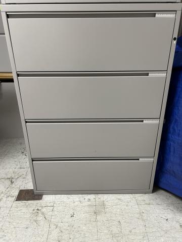 large gray metal 4 drawer filing cabinet