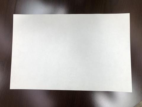 sheet of paper on table