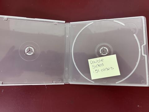 jewel case with post-it note that reads "double-sided - 51 cases"