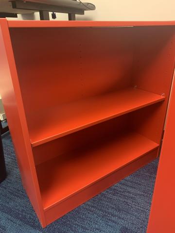 Red short book shelves
