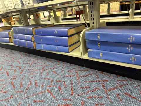 A stacked image of bound life magazines