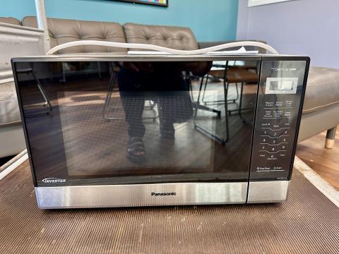 Microwave with black and stainless steel front