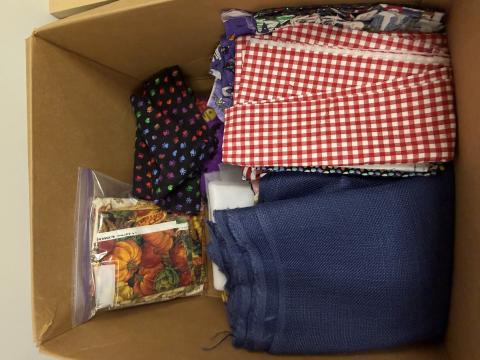 assorted fabrics in misc. colors and sizes