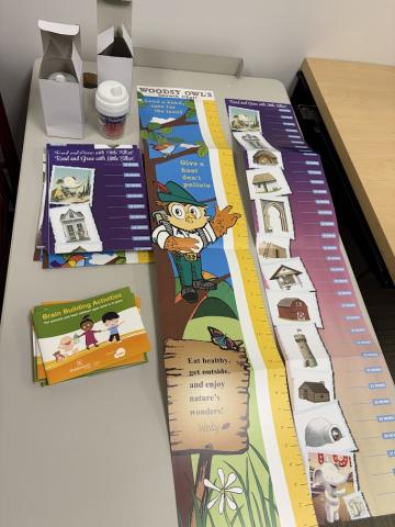 Growth charts, 2 sippy cups, brain building activity books