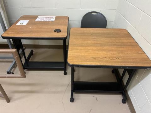 Two rolling desks with wooden tops. Dimensions are 30 H x 30 W x 28 H