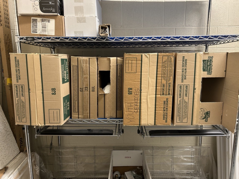 Cardboard boxes on a shelf
