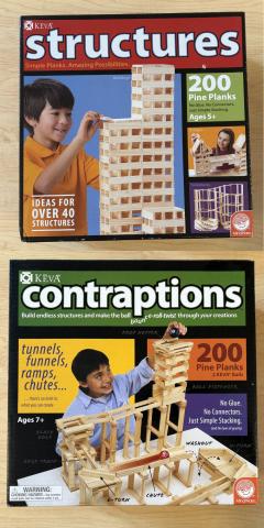 structures and contraptions kits in boxes on a wooden table