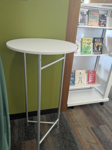 A circular freestanding table