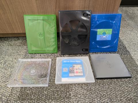 CD cases, large and small, variety of colors