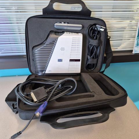 Projector and portable screen available for free