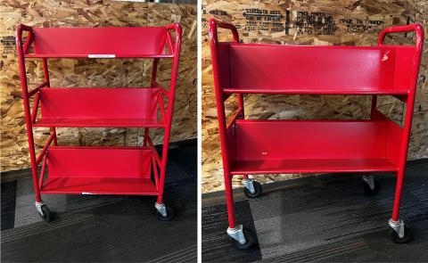 One 3-tiered red metal rolling book cart; one 2-tiered red metal rolling book cart