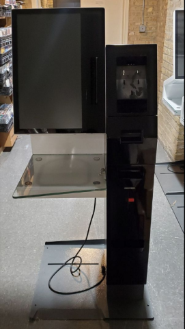 Operating System Win 7, accepts credit card reader (not included), dvd locker has been disabled but can be enabled, RFID pad built in for up to 15 items, 22" display