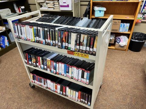 cart full of audiobooks on CD