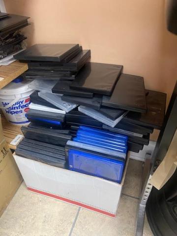 an assortment of DVD and Blu-ray cases