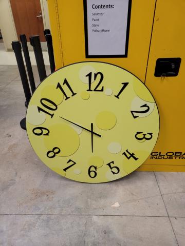 large yellow clock