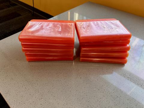 orange cases that hold playaways