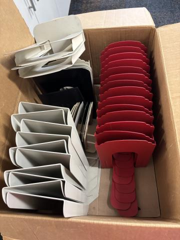 A box filled with random bookends 