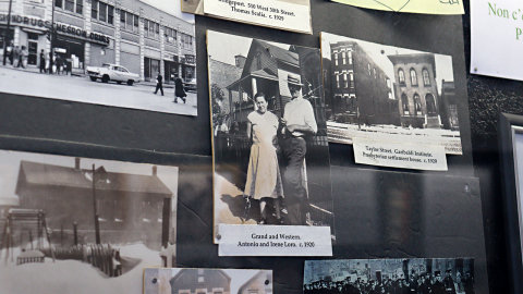 A collage of old black and white photos in a display case. One caption reads “Grand and Western, Antonio and Irene Loro. C. 1920” 