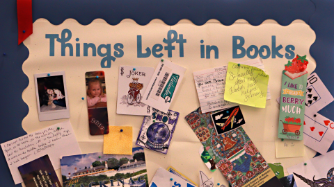 A sign titled Things Found in Books with various objects displayed underneath.