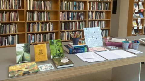 A library table display of poetry books