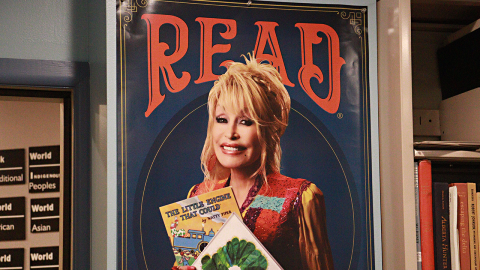 A Read poster featuring Dolly Parton. 