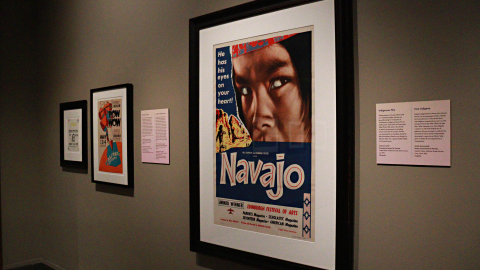 An exhibit displaying a movie poster of Navajo. 