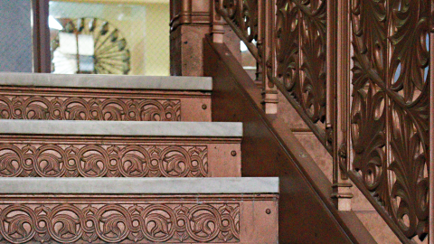 An ornately carved staircase at the Newberry Library. 